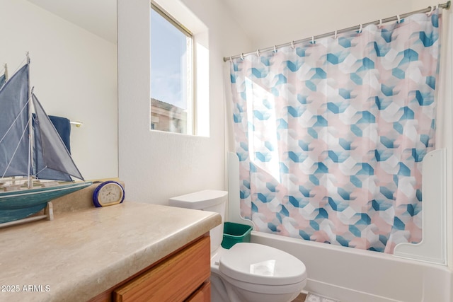 full bathroom featuring vanity, toilet, and shower / tub combo