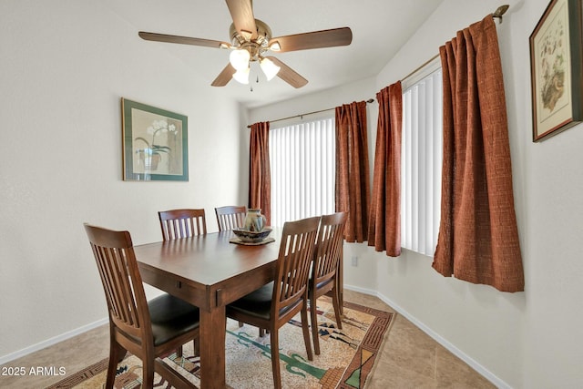 dining area with ceiling fan