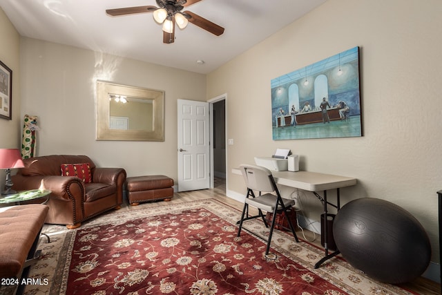 office space featuring hardwood / wood-style flooring and ceiling fan