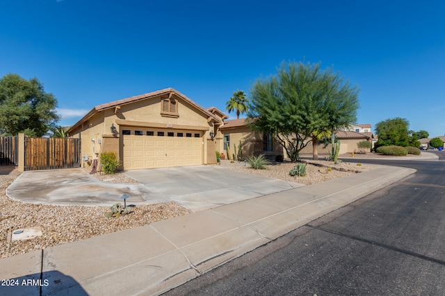 single story home featuring a garage