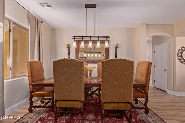 dining area featuring hardwood / wood-style flooring