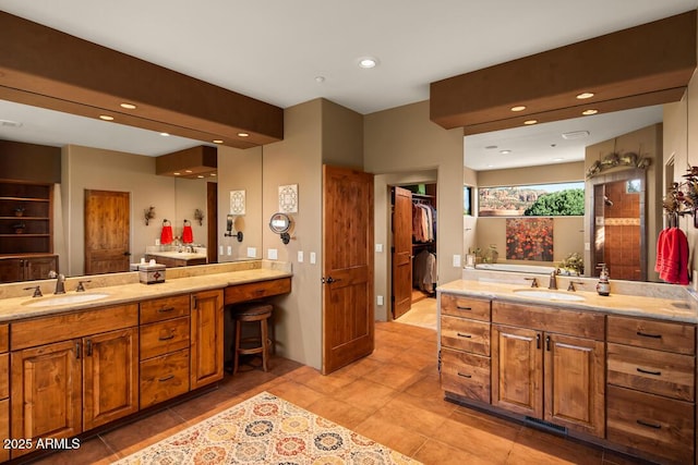 30 Paraiso Corte, Sedona, AZ 86351 - bathroom with vanity, tile patterned flooring, recessed lighting, and a walk in closet