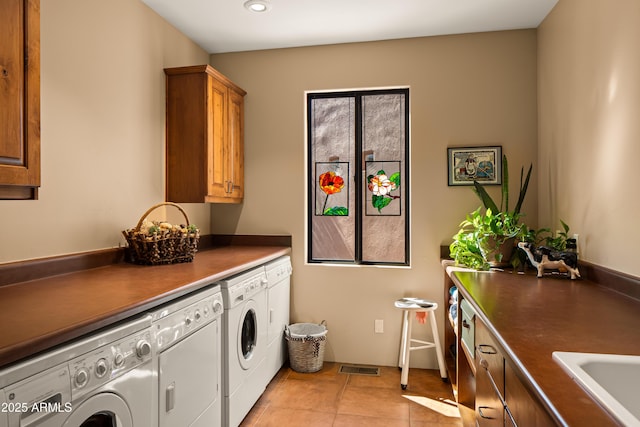 30 Paraiso Corte, Sedona, AZ 86351 - laundry area with separate washer and dryer, cabinet space, light tile patterned flooring, and recessed lighting