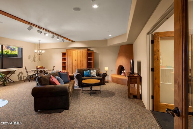 30 Paraiso Corte, Sedona, AZ 86351 - living room with carpet floors, track lighting, and a chandelier