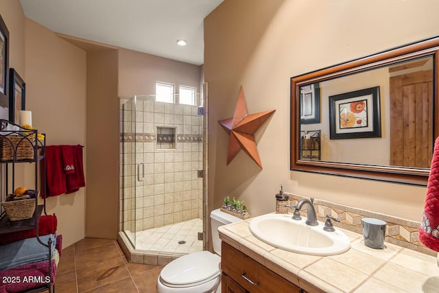 30 Paraiso Corte, Sedona, AZ 86351 - bathroom featuring vanity, a stall shower, toilet, tile patterned flooring, and recessed lighting