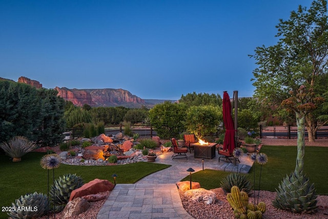 30 Paraiso Corte, Sedona, AZ 86351 - view of yard with a fire pit, a patio area, and a mountain view