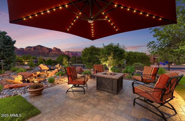 30 Paraiso Corte, Sedona, AZ 86351 - view of patio featuring an outdoor fire pit and a mountain view
