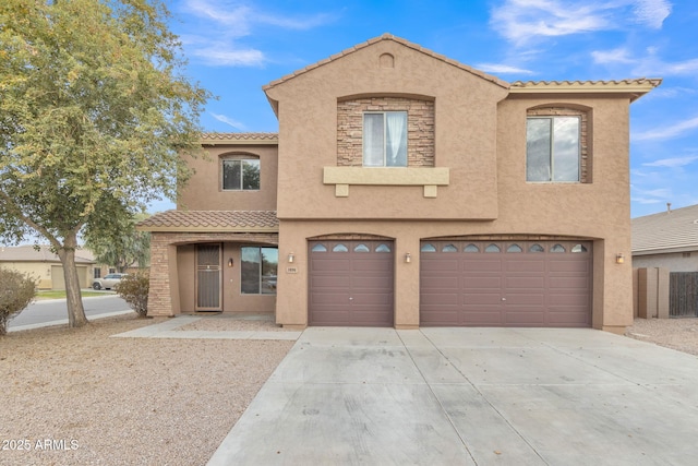 view of front of property with a garage