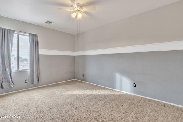 empty room with carpet flooring and ceiling fan