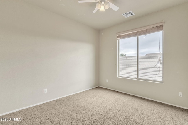 carpeted empty room with ceiling fan