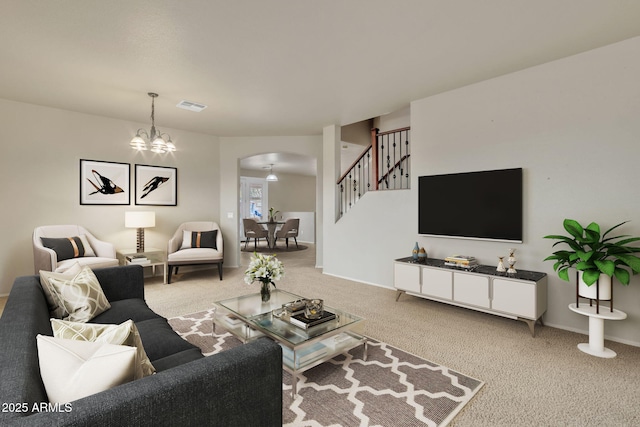 living room featuring a notable chandelier and carpet