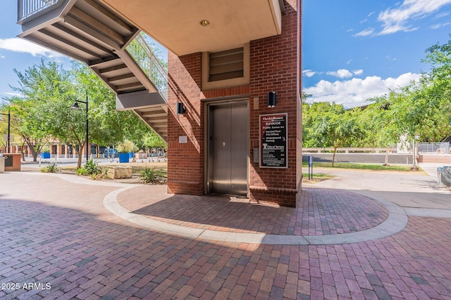 view of patio / terrace featuring elevator
