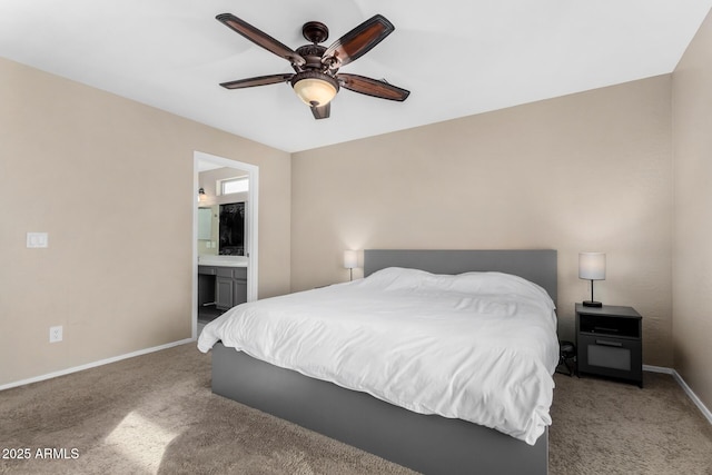 bedroom with connected bathroom, ceiling fan, and carpet flooring