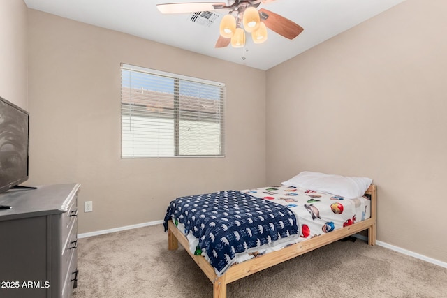 bedroom with light colored carpet and ceiling fan