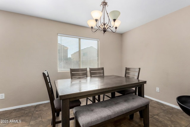 dining room featuring a notable chandelier