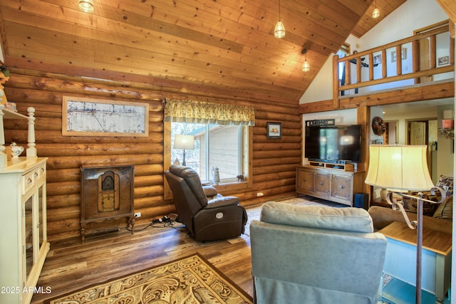 living area featuring wood finished floors, wood ceiling, high vaulted ceiling, and rustic walls