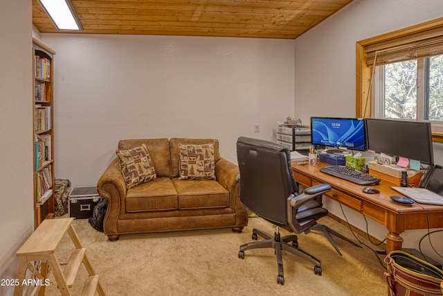 home office featuring wood ceiling and carpet