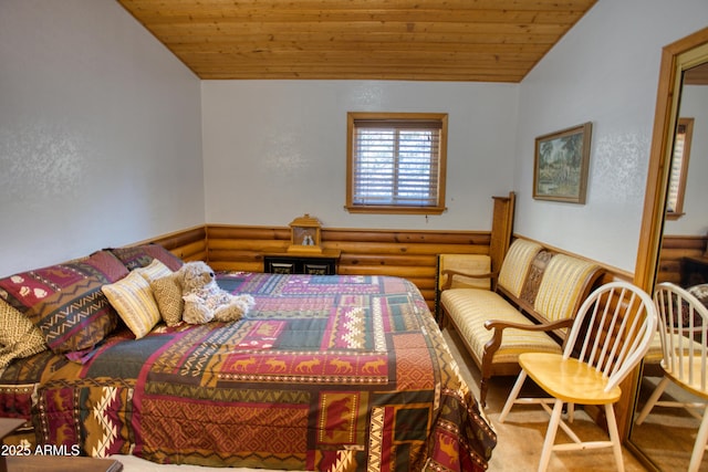 bedroom featuring wood ceiling and vaulted ceiling