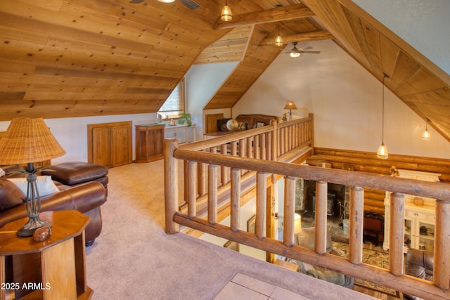 additional living space featuring ceiling fan, wooden ceiling, lofted ceiling, and carpet flooring