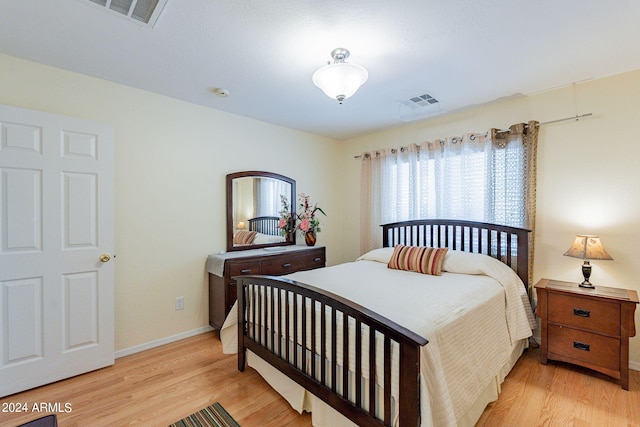 bedroom featuring light hardwood / wood-style flooring