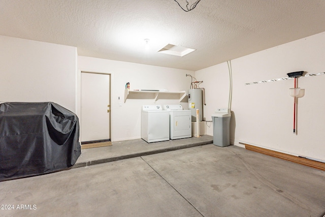 368 S 18th St, Coolidge, AZ 85128 - interior space featuring independent washer and dryer, water heater, laundry area, and a textured ceiling