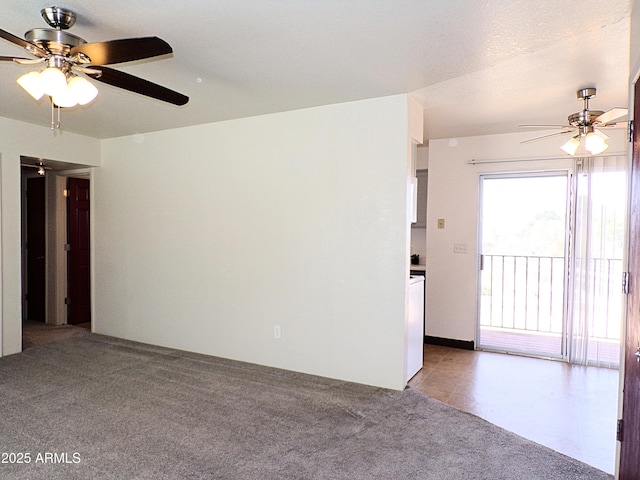 empty room with carpet and ceiling fan