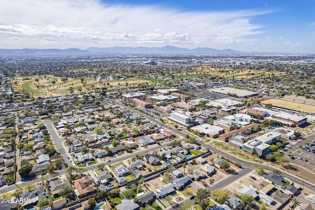 bird's eye view with a residential view and a mountain view