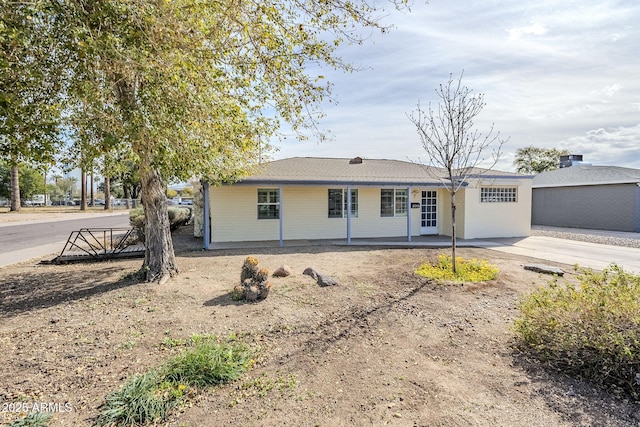 ranch-style house featuring a patio