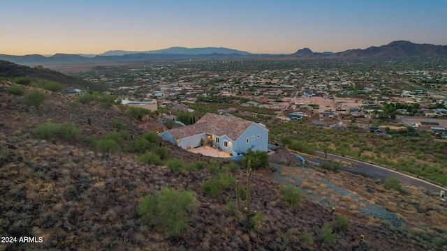 aerial view at dusk with a mountain view