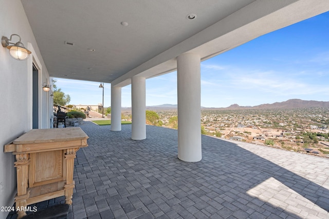 view of patio featuring a mountain view