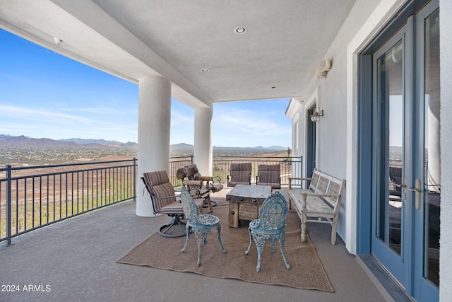 view of patio featuring a mountain view