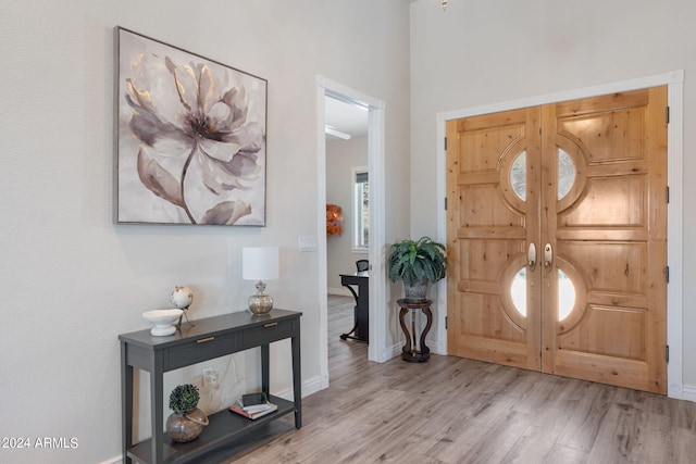 entryway with light hardwood / wood-style floors