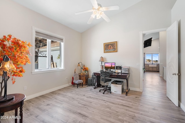 office area with light hardwood / wood-style flooring, ceiling fan, and plenty of natural light