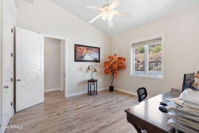 office featuring lofted ceiling, ceiling fan, and light hardwood / wood-style flooring