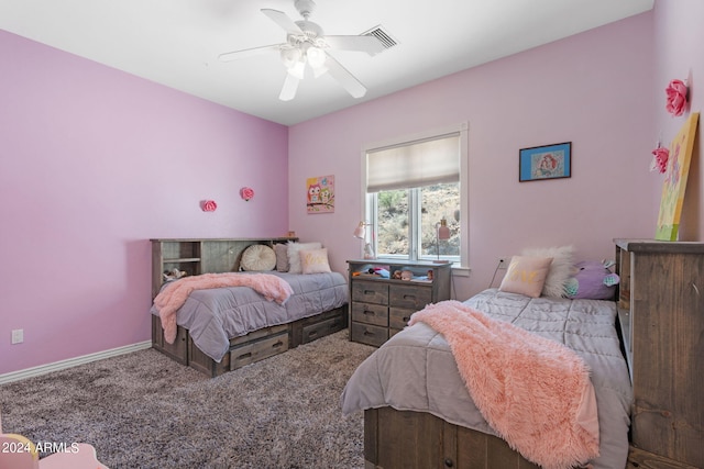 bedroom with ceiling fan and light colored carpet