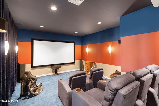 home theater room with carpet flooring