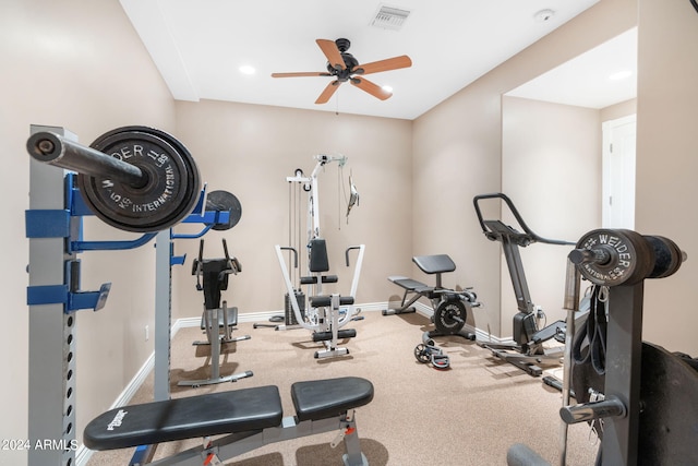 exercise room with ceiling fan