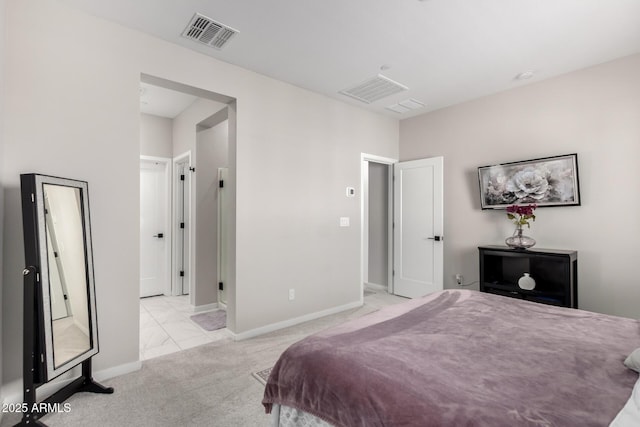 bedroom featuring light carpet, visible vents, and baseboards