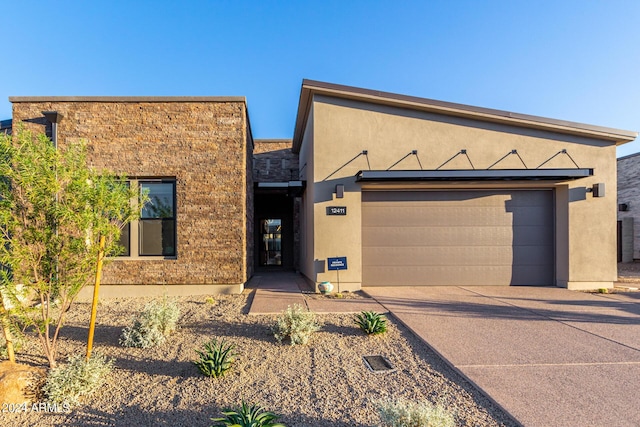 contemporary home with a garage