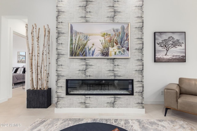 tiled living room with a large fireplace