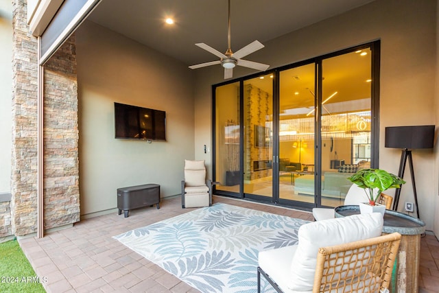 view of patio / terrace featuring ceiling fan