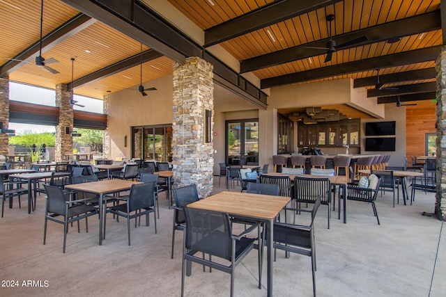 view of patio featuring ceiling fan