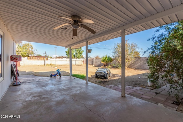 view of patio featuring ceiling fan