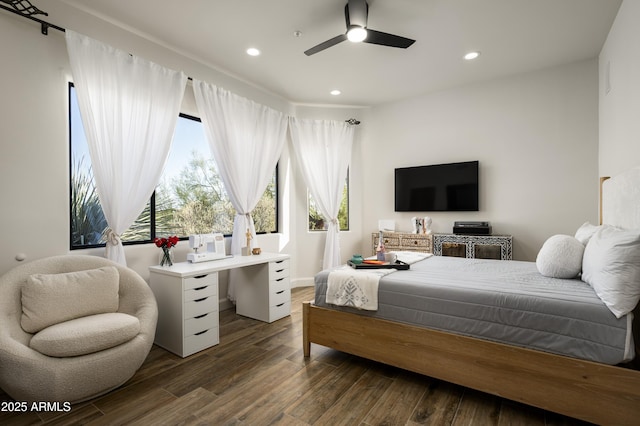 bedroom with a ceiling fan, recessed lighting, and wood finished floors