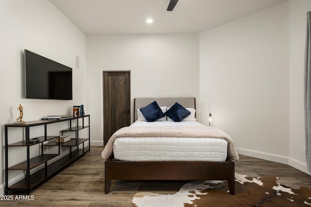 bedroom featuring visible vents, recessed lighting, baseboards, and wood finished floors