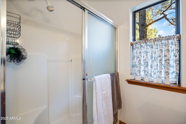 bathroom featuring a stall shower