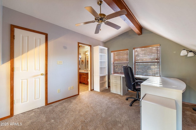 home office featuring baseboards, light colored carpet, ceiling fan, and vaulted ceiling with beams