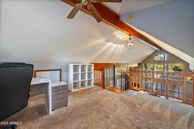 office area with vaulted ceiling with beams, carpet, and a ceiling fan