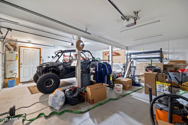 garage with a garage door opener and water heater