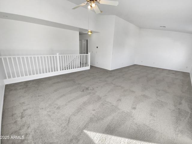 interior space featuring ceiling fan and carpet flooring